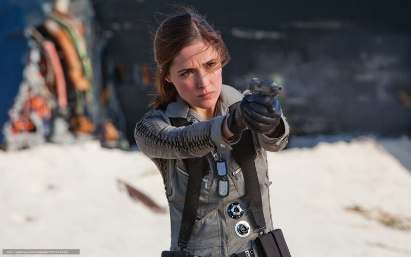 woman aiming a gun