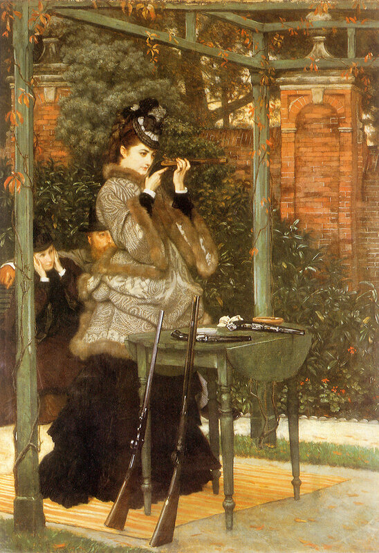 Woman aiming a rifle in garden