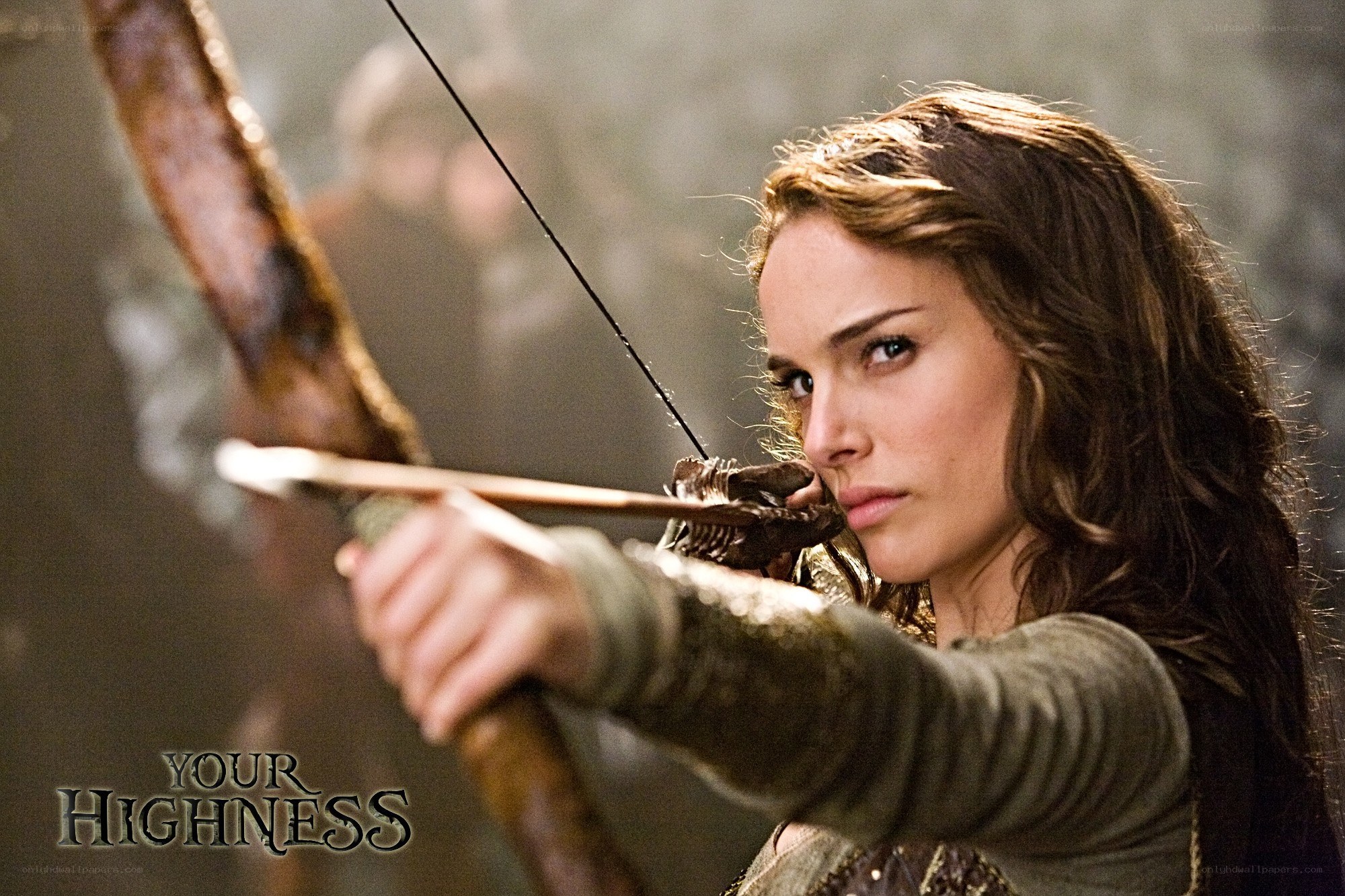 woman aiming bow and arrow