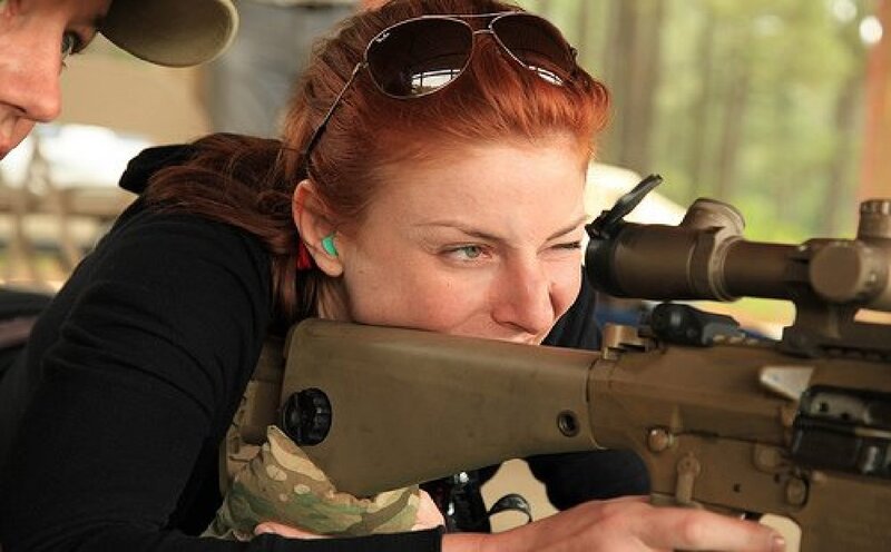 Woman Aiming Rifle — Brown