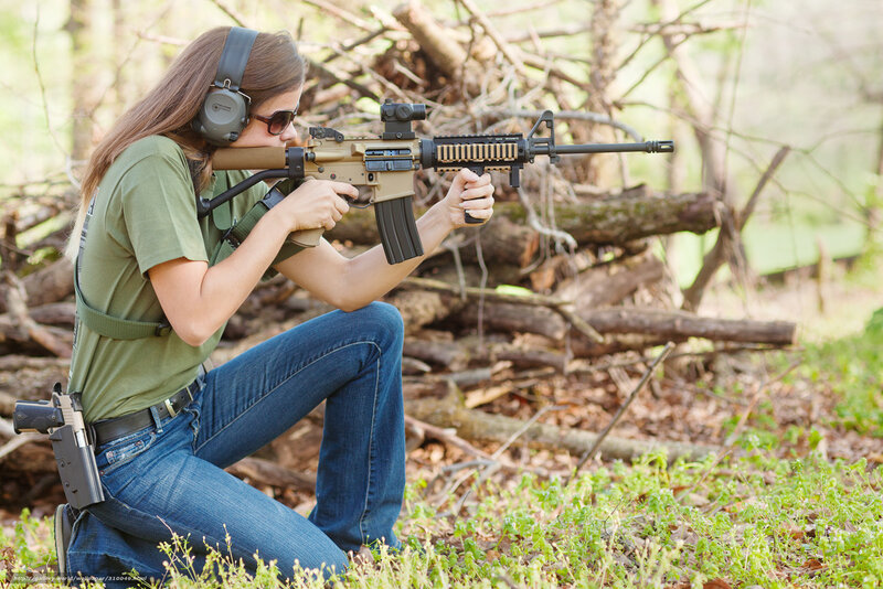 Woman Aiming Rifle — Green, Focused, Afternoon, Photograph