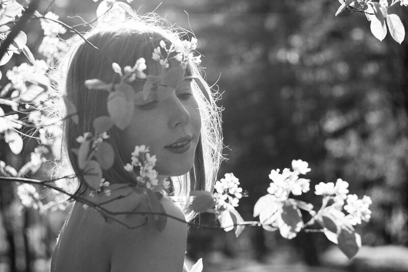 Woman Among Blossoms