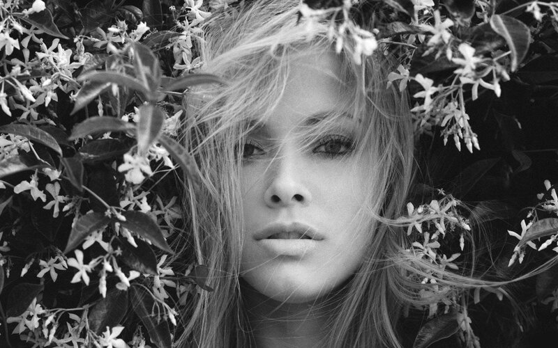 woman among white flowers