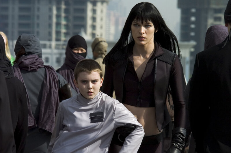 Woman and boy in futuristic setting