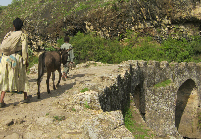 Woman and Boy with Donkey