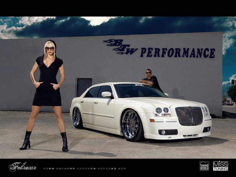woman and car at performance shop