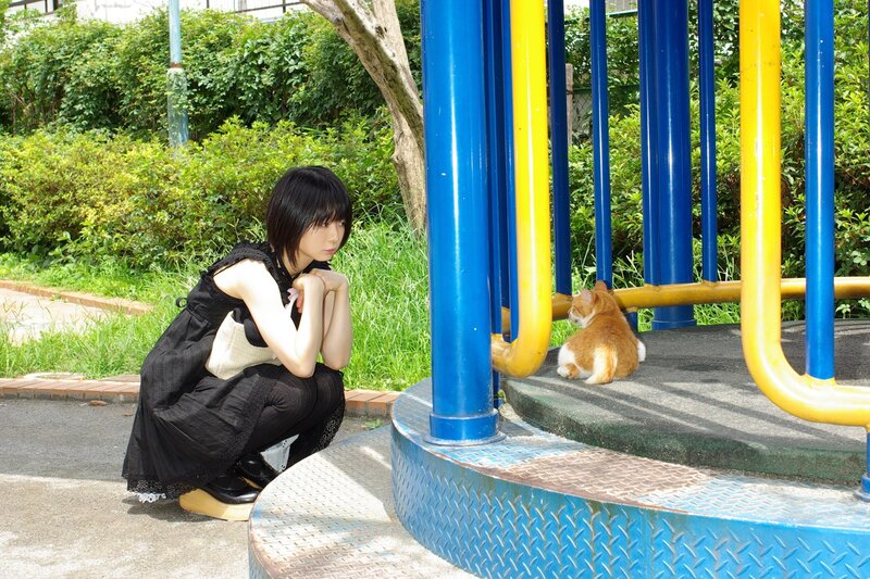 Woman and cat at playground