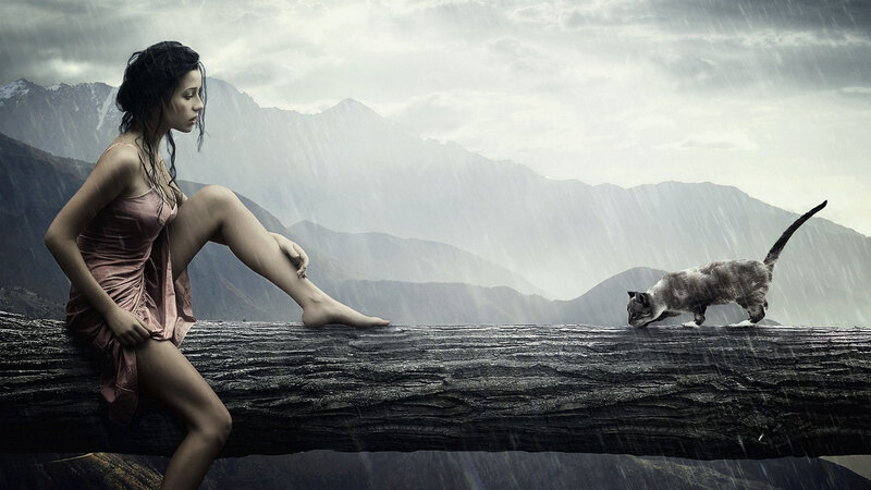 Woman and cat in the rain