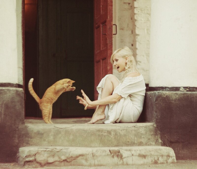 Woman and Cat on Steps