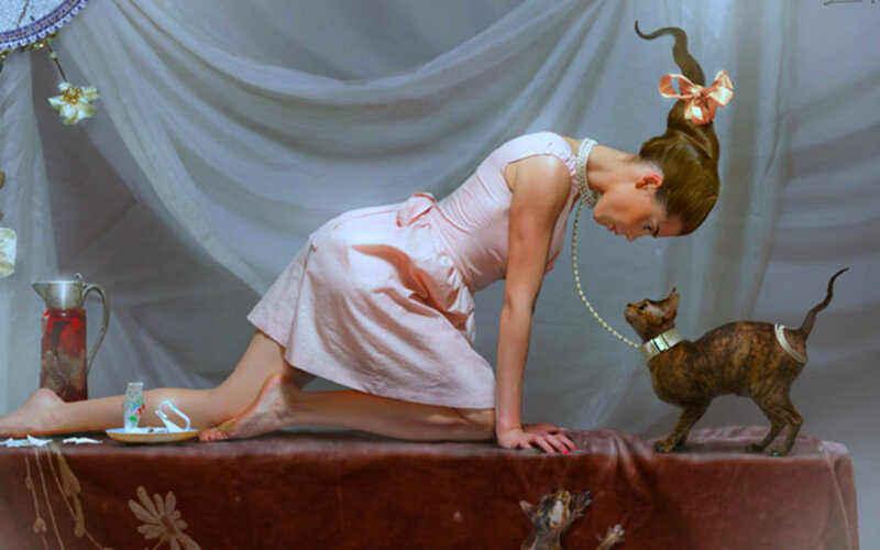 Woman and Cat on Table