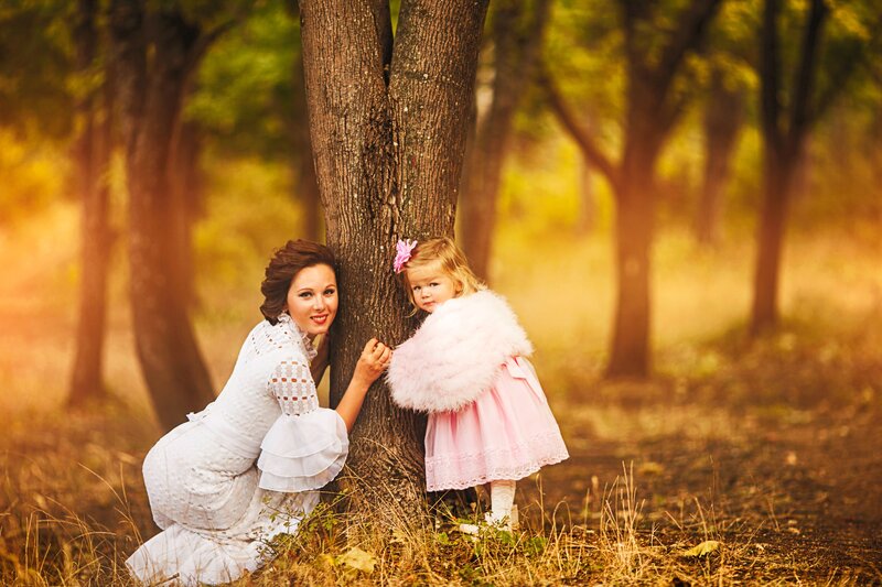 Woman and Child by Tree
