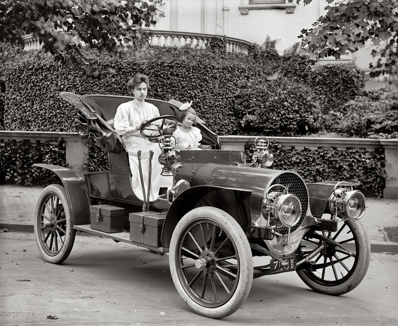 Woman and Child in Car — Black