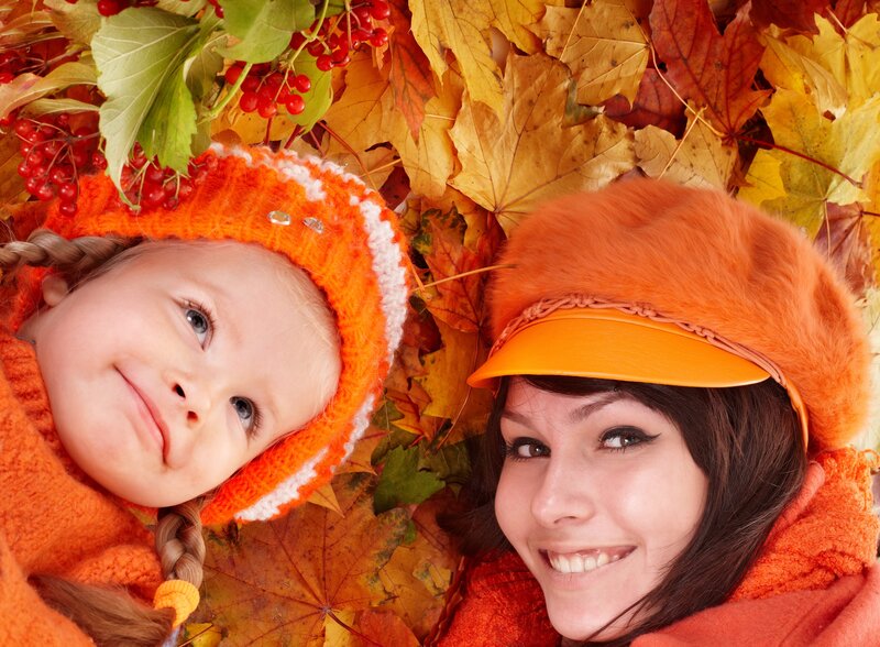 Woman and Child in Leaves — Orange, Happy