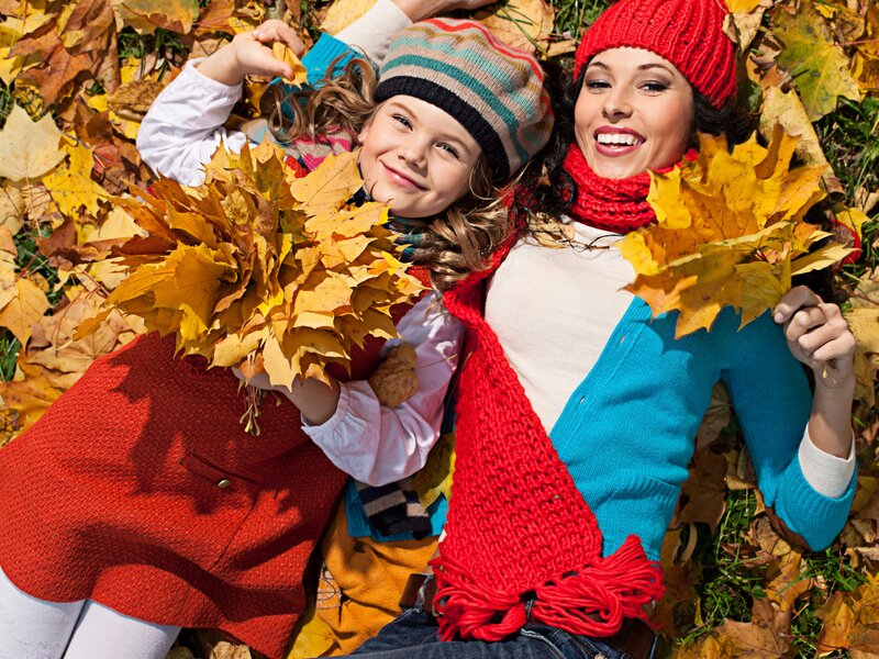 Woman and Child in Leaves