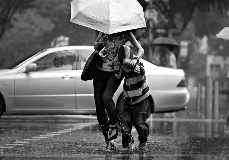 Woman and Child in Rain