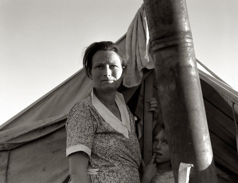 Woman and child in tent