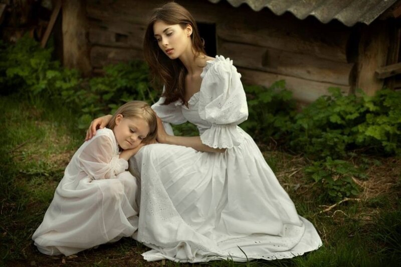 Woman and Child in White — Serene