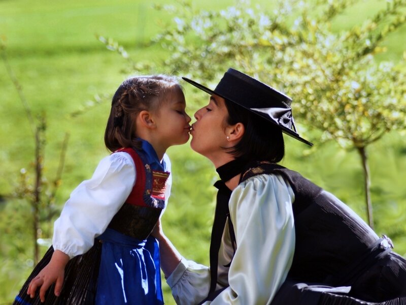 Woman and Child Kissing