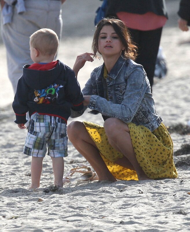 woman and child on beach
