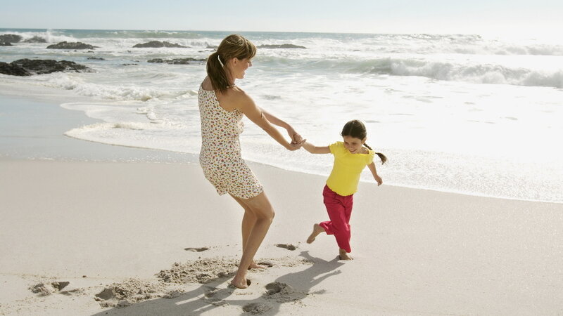 Woman and Child on Beach — White