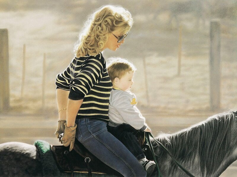 woman and child on horseback