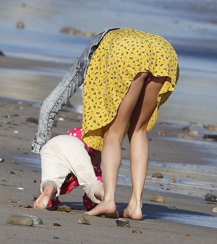Woman and child on the beach