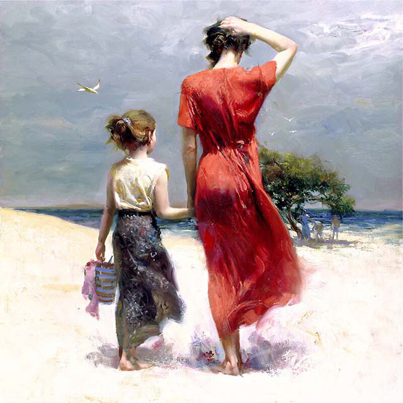 Woman and child on the beach
