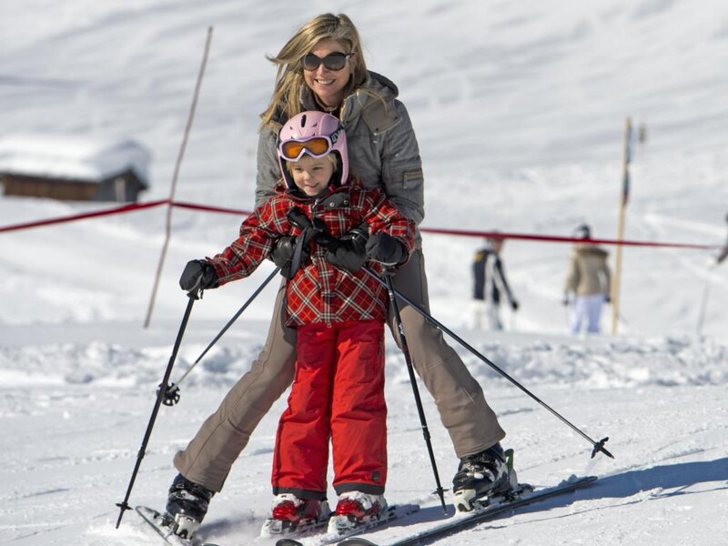 Woman and Child Skiing