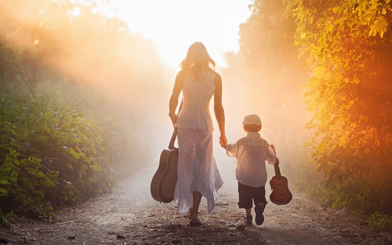 Woman and Child Walking — Gold