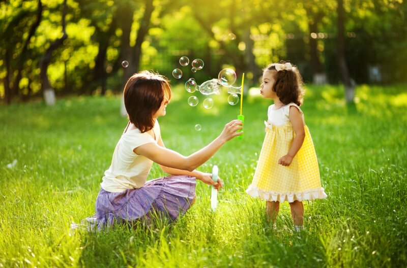 Woman and Child with Bubbles