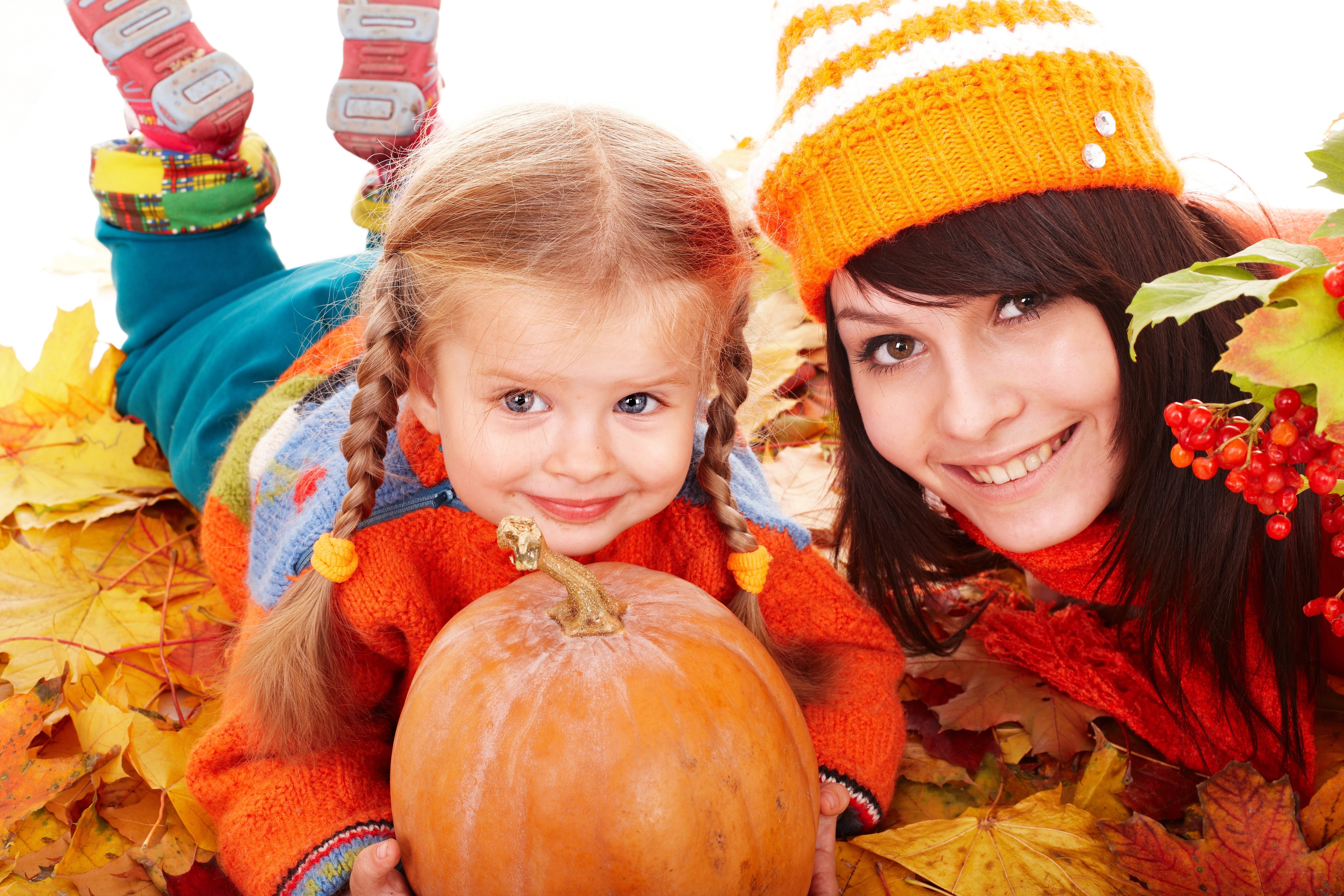 woman and child with pumpkin