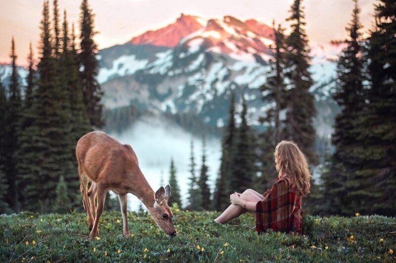 Woman and Deer in Mountains