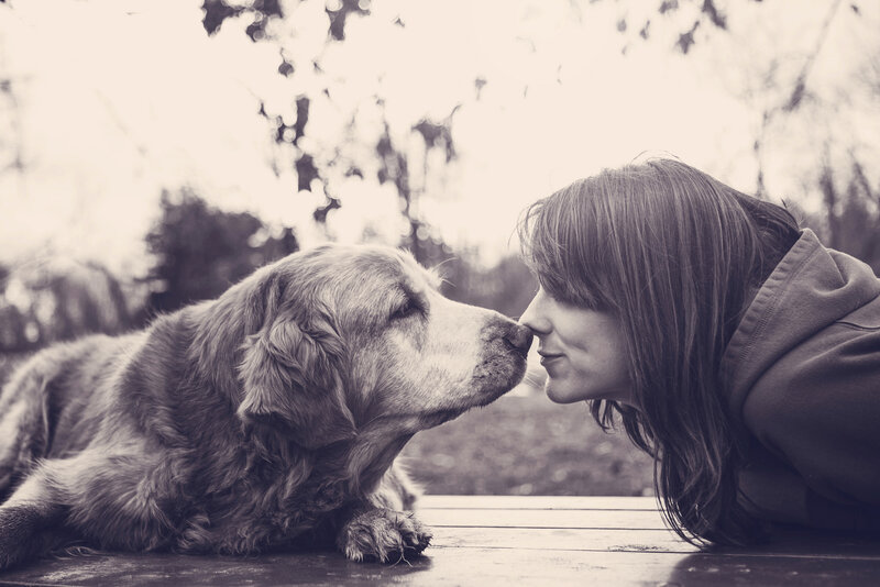 Woman and Dog Nose-to-nose — Black