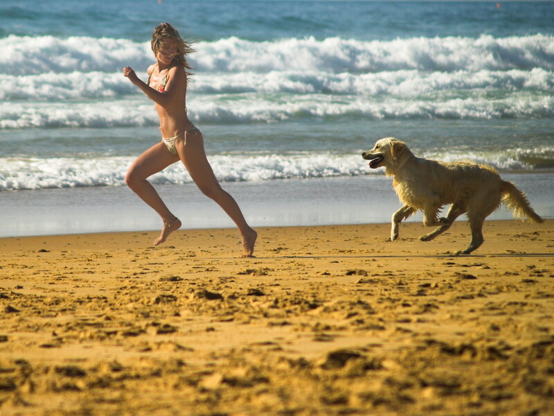 Woman and Dog Running