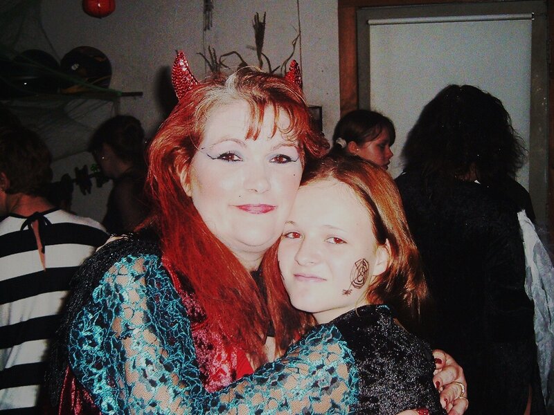 Woman and girl in costumes
