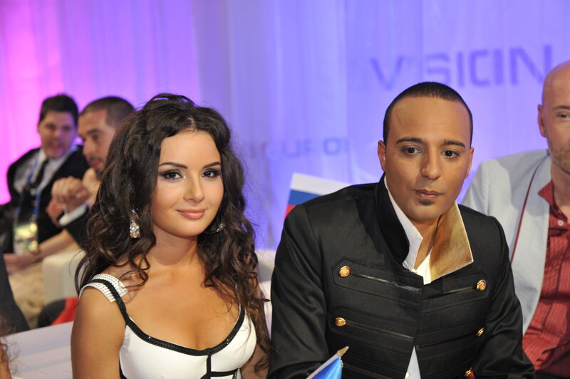 Woman and Man at Event — Purple