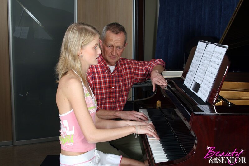 Woman and Man at Piano — Brown