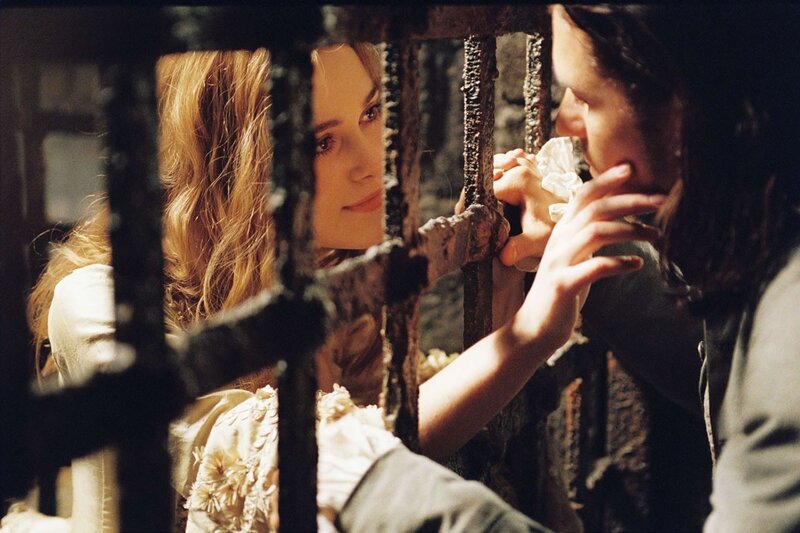 Woman and Man Behind Bars