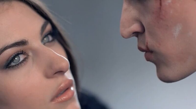 Woman and Man Facing Each Other