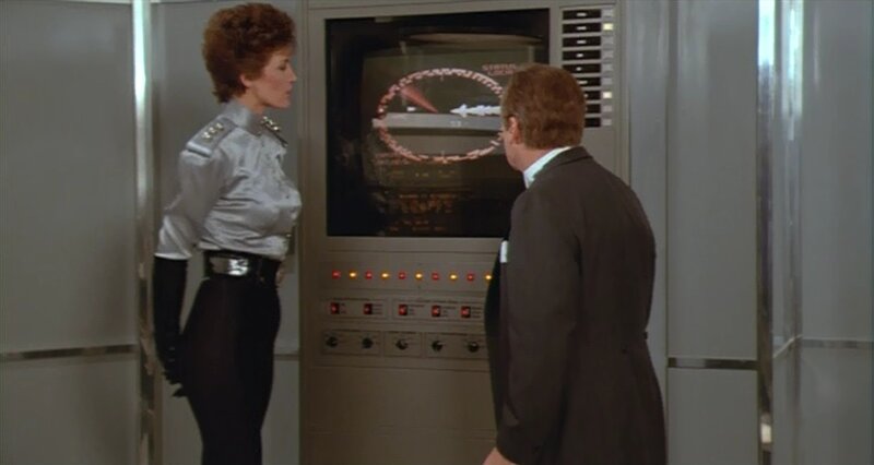 Woman and Man in Control Room