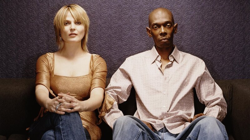 Woman and Man on Couch — Purple