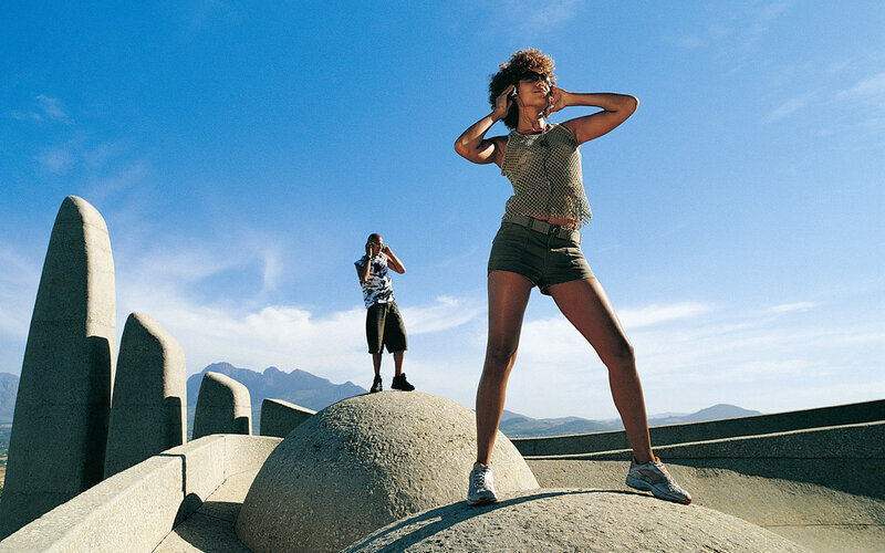 Woman and Man on Sculpture