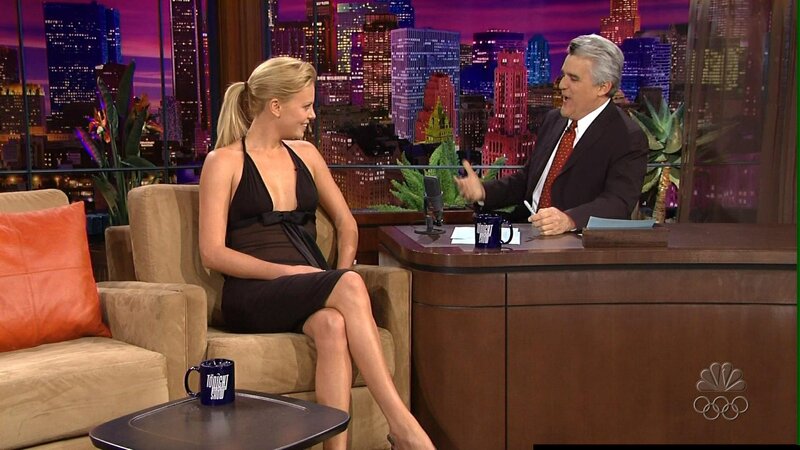 Woman and Man on Talk Show — Black
