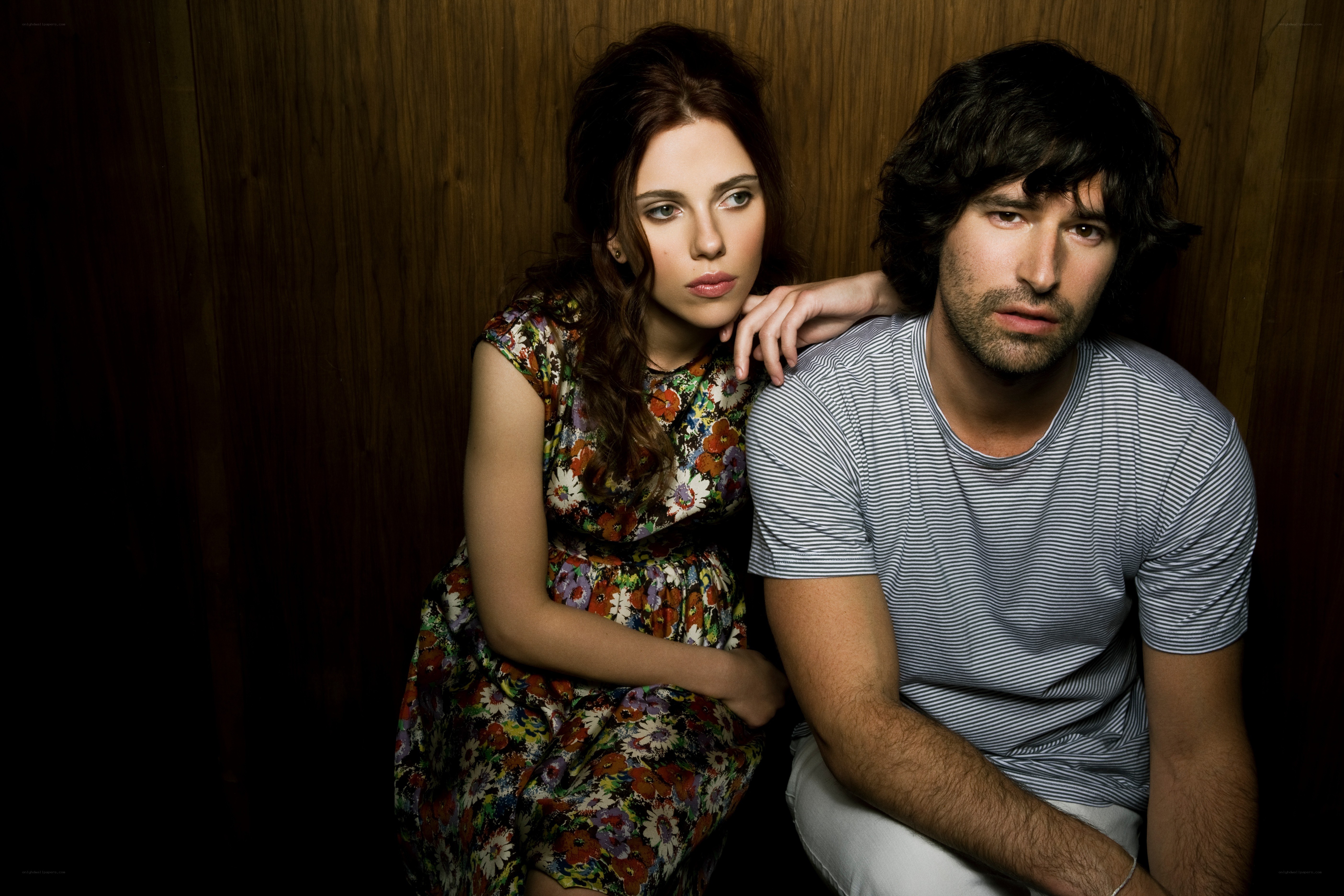 woman and man posing together