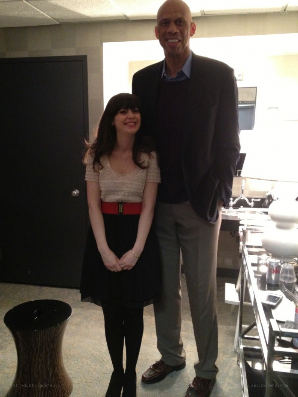 woman and man posing together