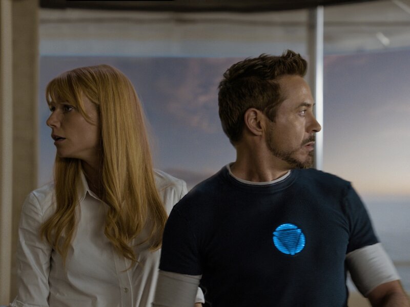 Woman and Man Standing — Blue, Serious