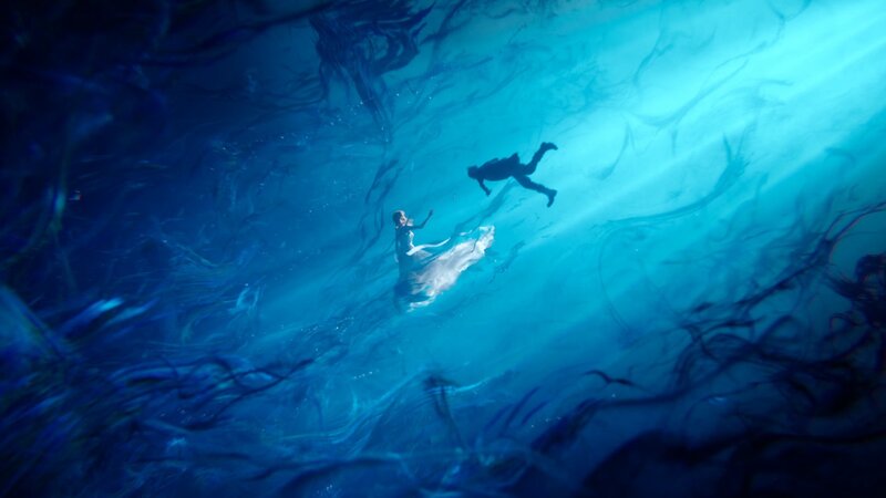 Woman and Man Underwater