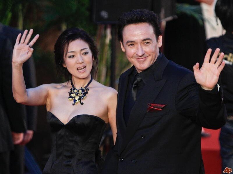 Woman and Man Waving