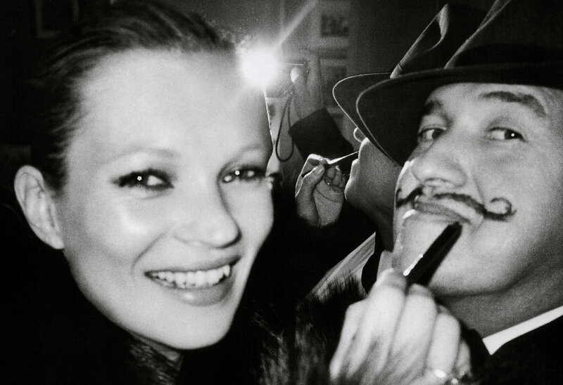 woman and man with fake mustache