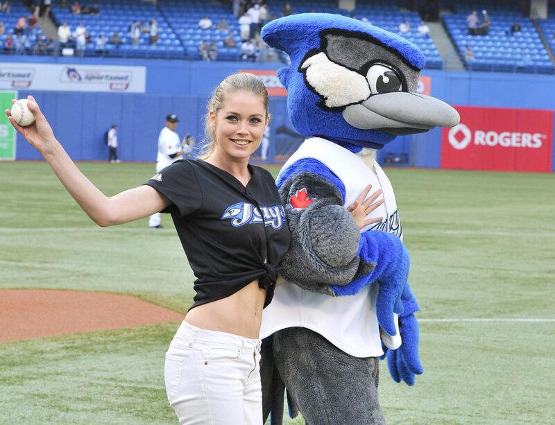Woman and Mascot on Field